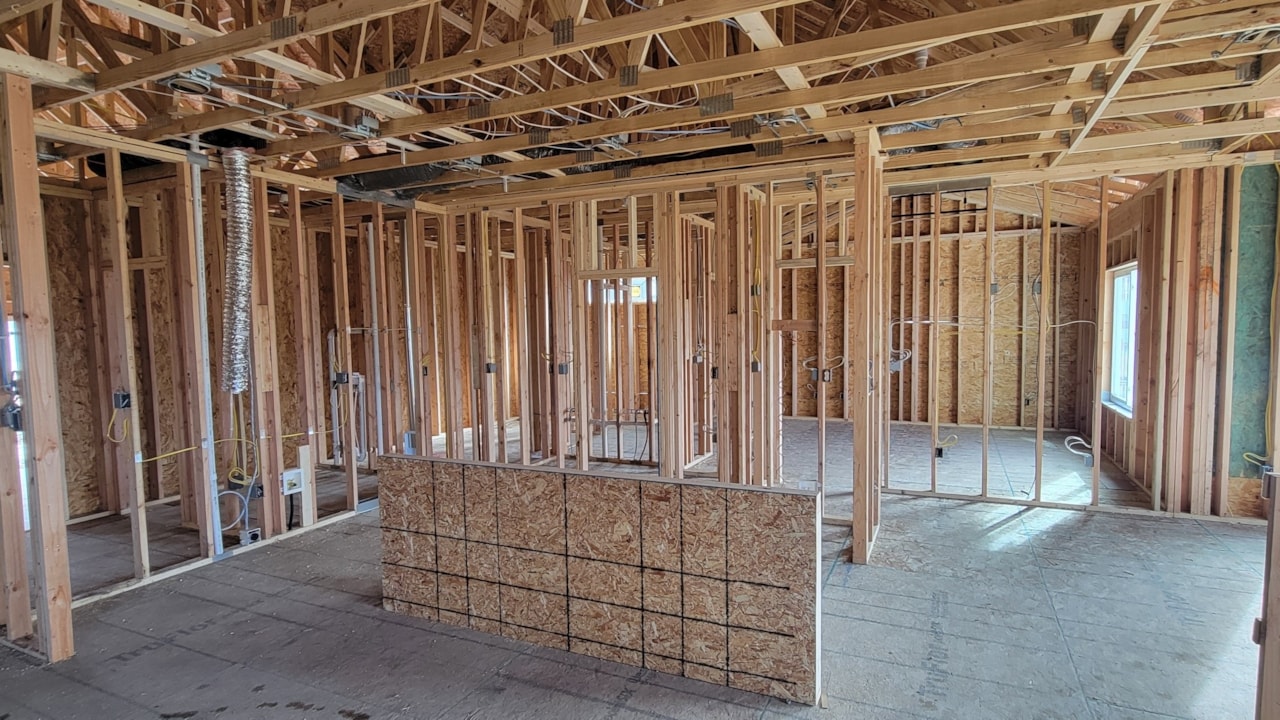 Room featuring wood framing and drywall, showcasing Happe Homes' new move-in ready homes in Ankeny, IA
