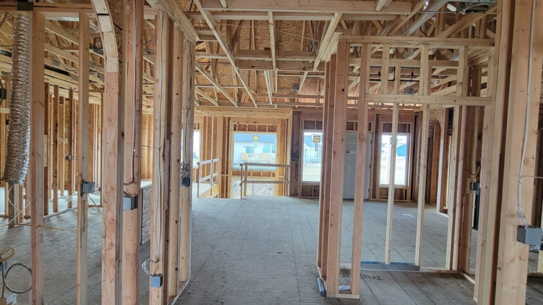 Room featuring wood framing and trim, showcasing Happe Homes' available move-in ready homes in Ankeny, IA